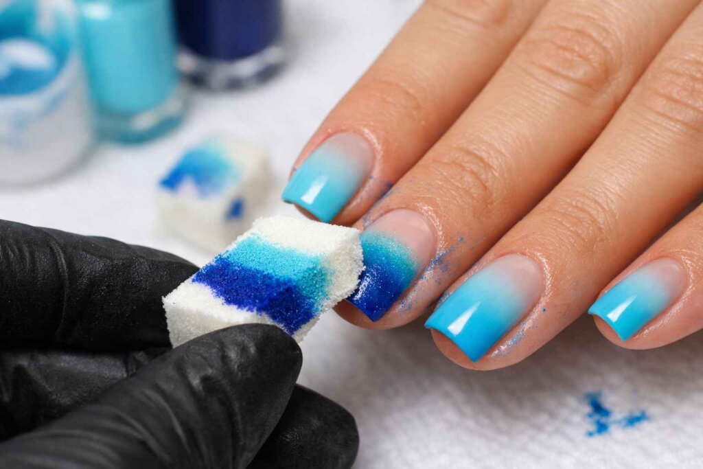 Step-by-step tutorial showing Bali nails blue gradient application using makeup sponge technique on square nails