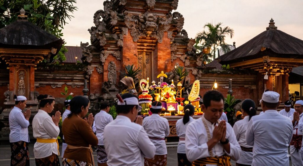 A serene temple setting during the Odalan rituals, capturing the essence of spirituality and community. In the foreground, a group of participants dressed in traditional Balinese attire, engaging in prayer with hands clasped and eyes closed, radiating solemnity and devotion. In the middle ground, a vibrant altar adorned with colorful offerings, flowers, and incense, illuminated by soft, warm lighting that enhances the sacred atmosphere. The background features the intricate architecture of a Balinese temple, with ornate carvings and lush greenery, providing a tranquil backdrop. The scene is bathed in the golden light of the late afternoon, creating a harmonious and reflective mood that invites viewers to immerse themselves in the sacred ceremony. The composition mimics a wide-angle view, capturing both details and the grandness of the occasion. A serene temple setting during the Odalan rituals, capturing the essence of spirituality and community. In the foreground, a group of participants dressed in traditional Balinese attire, engaging in prayer with hands clasped and eyes closed, radiating solemnity and devotion. In the middle ground, a vibrant altar adorned with colorful offerings, flowers, and incense, illuminated by soft, warm lighting that enhances the sacred atmosphere. The background features the intricate architecture of a Balinese temple, with ornate carvings and lush greenery, providing a tranquil backdrop. The scene is bathed in the golden light of the late afternoon, creating a harmonious and reflective mood that invites viewers to immerse themselves in the sacred ceremony. The composition mimics a wide-angle view, capturing both details and the grandness of the occasion.