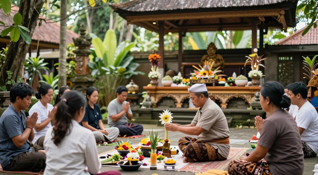 A serene traditional Balinese healing ceremony set in a lush, tropical environment. In the foreground, a healer, dressed in modest traditional Balinese attire, conducts a ritual with offerings of vibrant flowers and herbs. Surrounding them are participants, wearing casual yet respectful clothing, engaged in meditation and prayer. In the middle ground, an altar decorated with intricate carvings and natural elements enhances the cultural setting. The background features a traditional open-air pavilion (bale) surrounded by lush greenery, with soft sunlight filtering through the leaves, creating a tranquil atmosphere. The overall mood conveys peace, spirituality, and connection to nature. Capture this scene using a soft focus lens to emphasize the warmth of the ceremony, while maintaining a natural, documentary-style aesthetic typical of professional photojournalism.