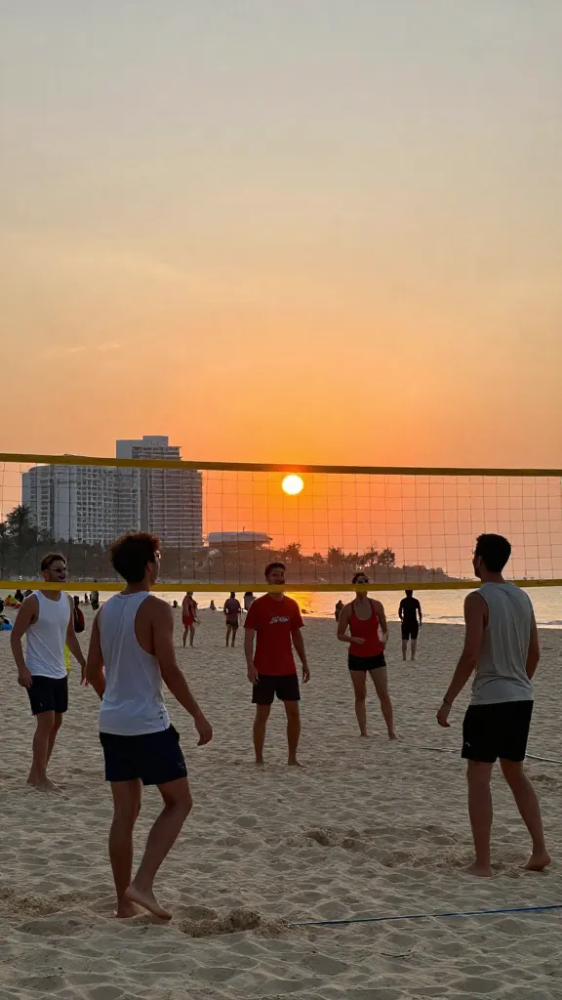 Join a Sunset Beach Volleyball Game